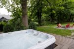 Enjoy the sparkling clean hot tub and the vibes on the Patio